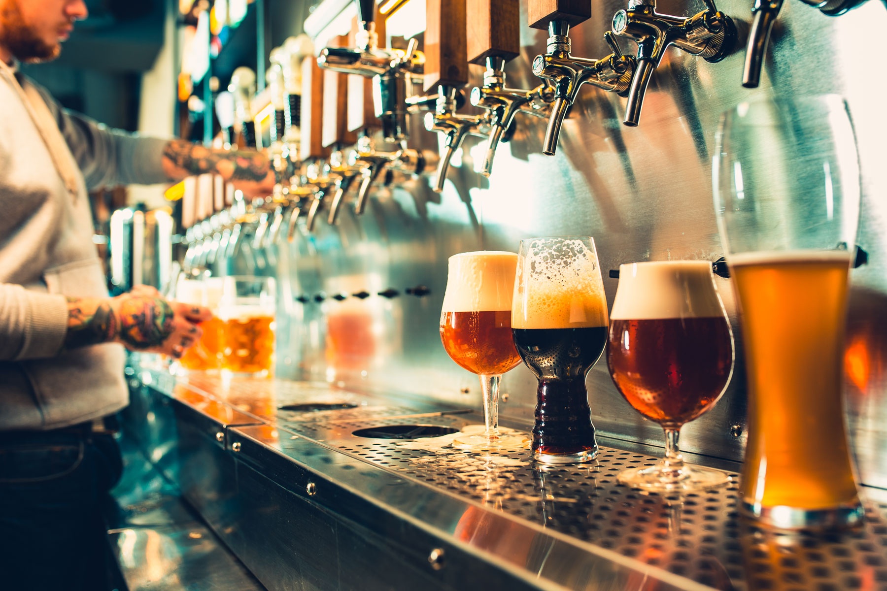 4 glasses of different beers